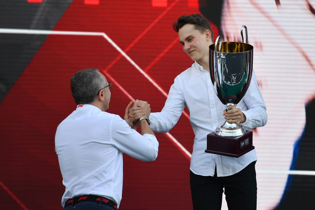 Оскар Пиастри на подиуме Формулы–1